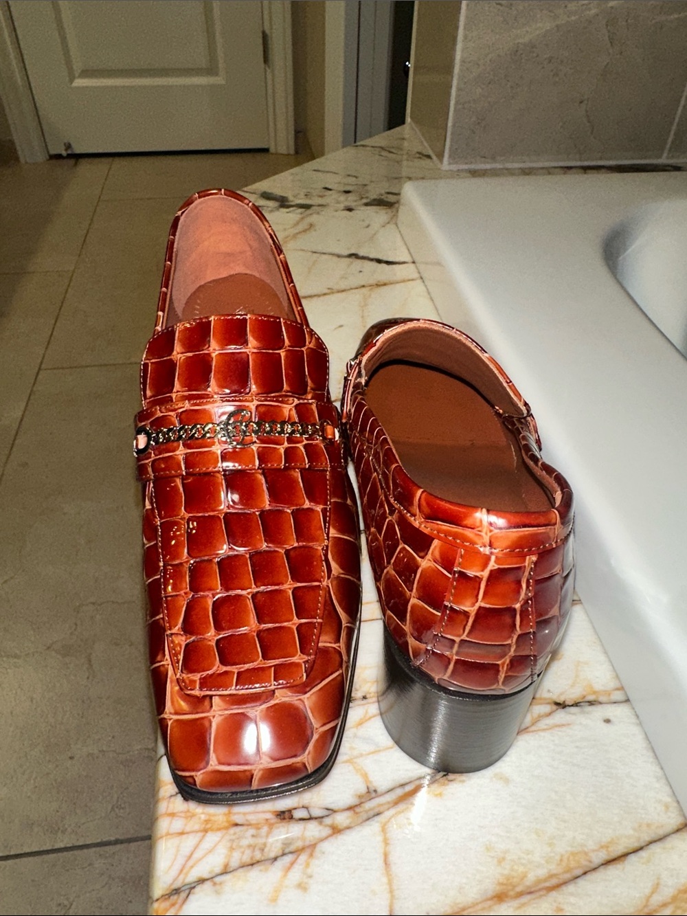 Christian Louboutin Croc-Embossed Leather Loafers in Burnt Orange